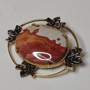 Vintage Oval Shaped Metal And Stone Brooch With Leaves